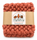 RUST HAND KNITTED COASTER SET