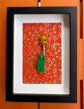 FRAMED GREEN BRICK FIGURE WITH BALLOON