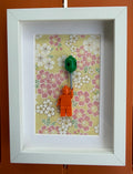 FRAMED ORANGE BRICK FIGURE WITH BALLOON