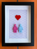 FRAMED PINK & BLUE BRICK FIGURE COUPLE WITH BRICK HEART