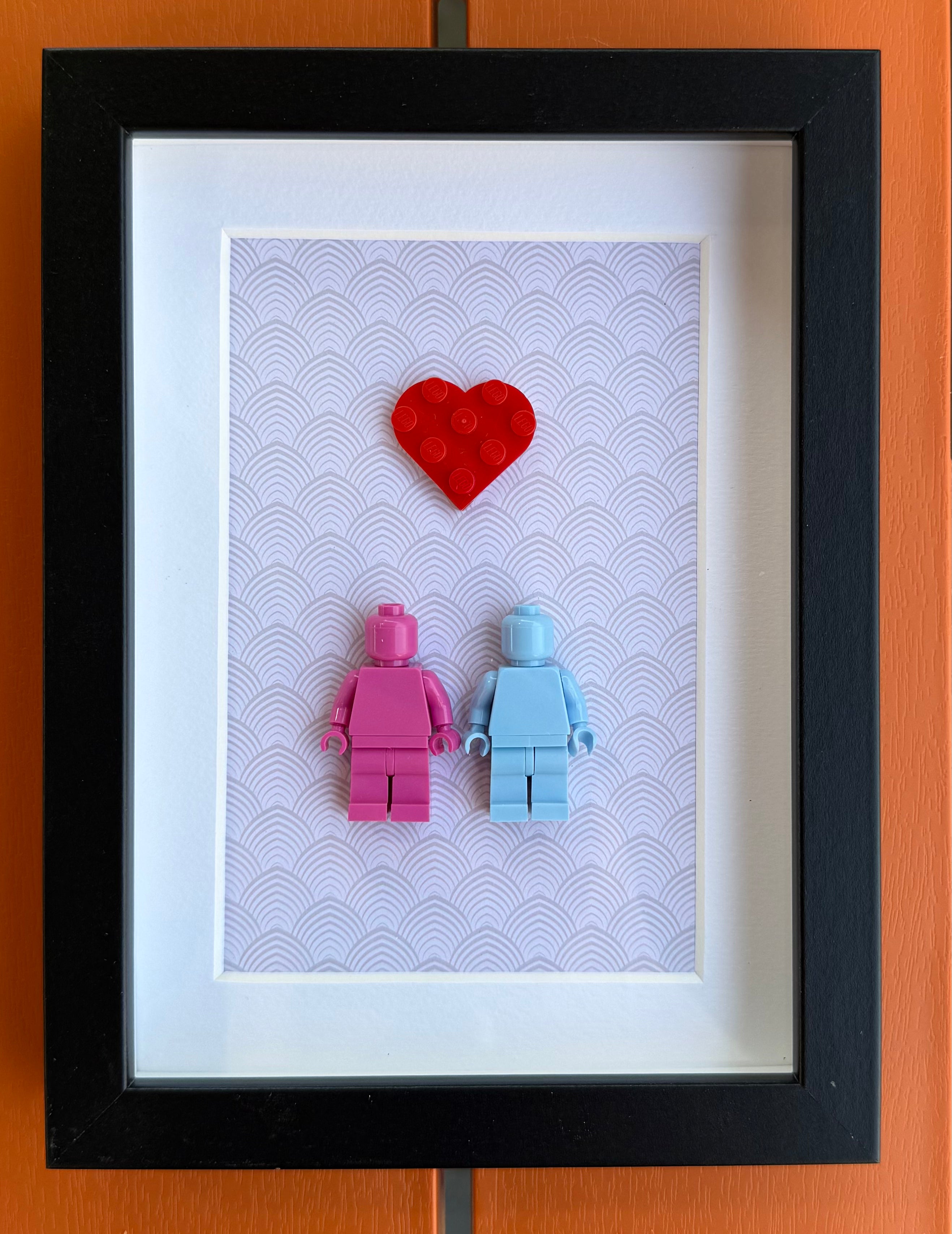 FRAMED PINK & BLUE BRICK FIGURE COUPLE WITH BRICK HEART
