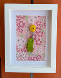 FRAMED GREEN BRICK FIGURE WITH BALLOON