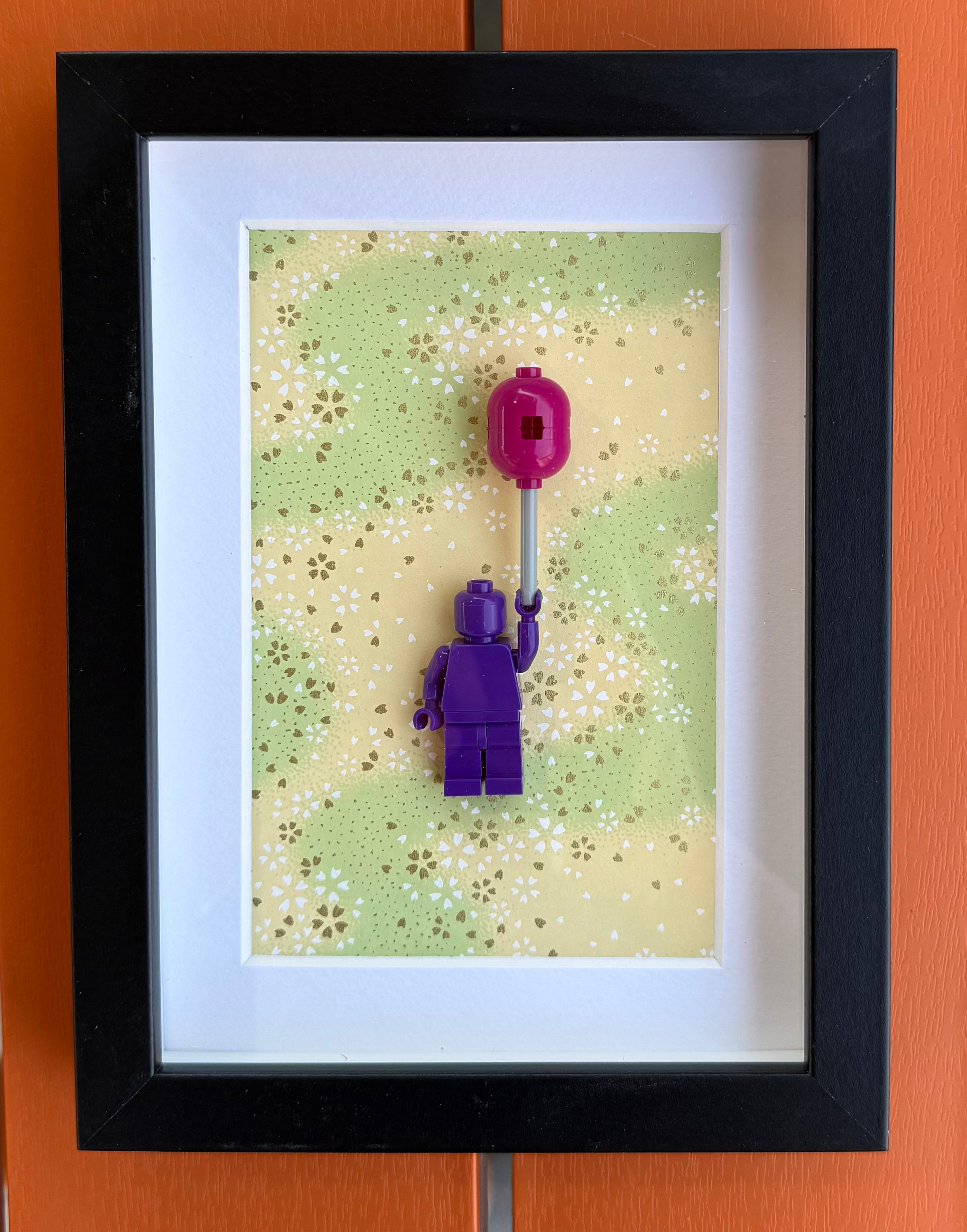 FRAMED PURPLE BRICK FIGURE WITH BALLOON