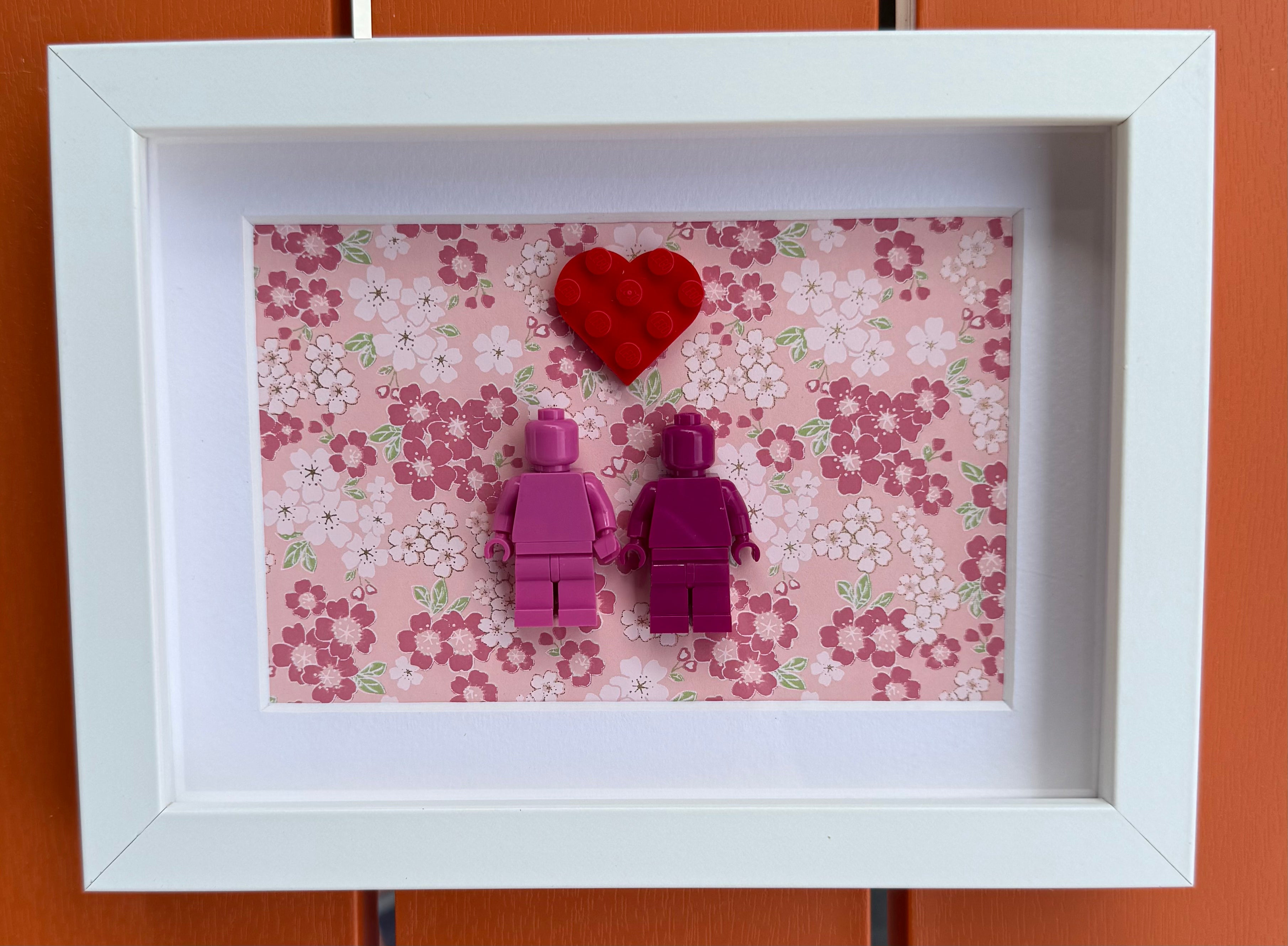 FRAMED PINK BRICK FIGURE COUPLE WITH HEART