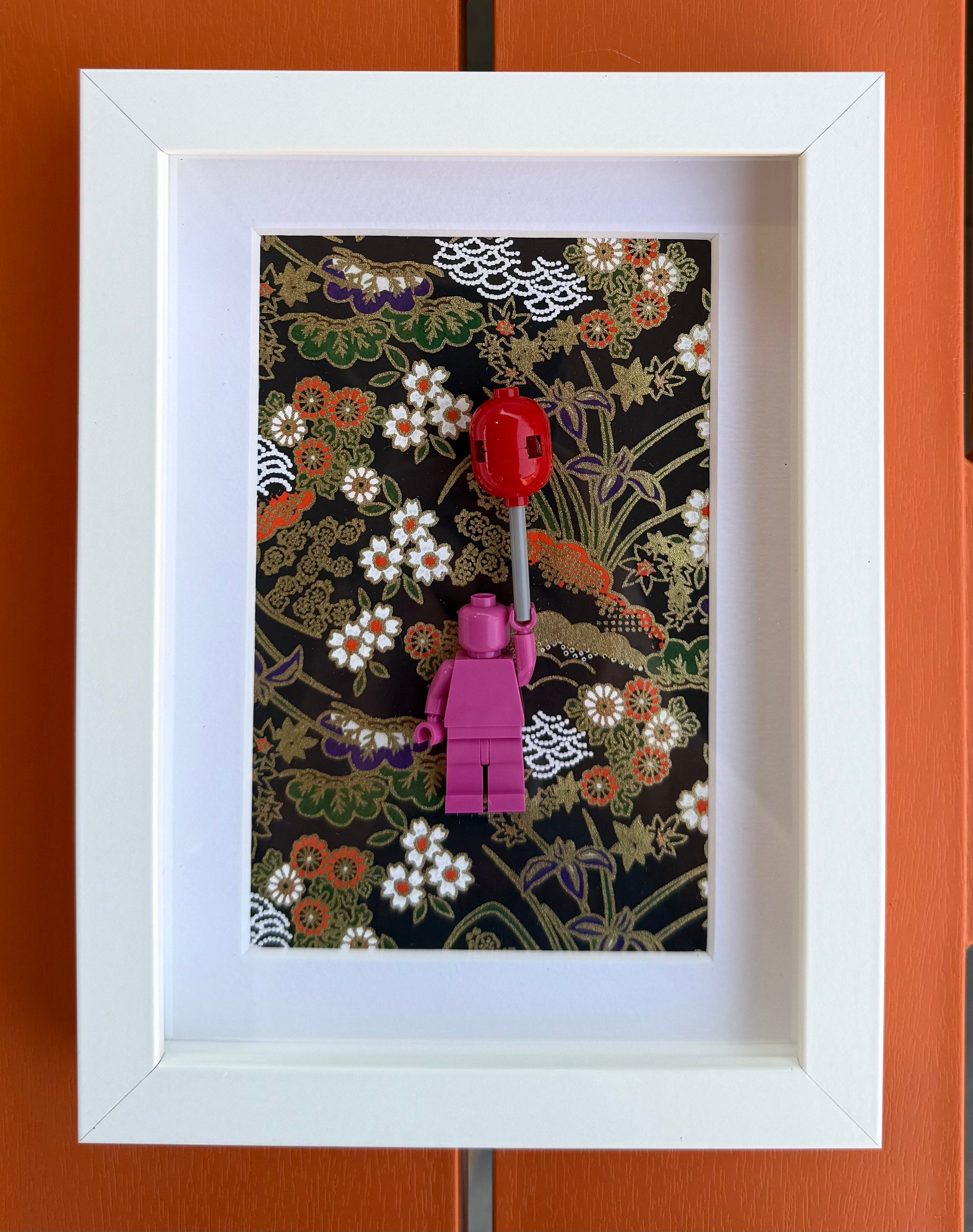 FRAMED PINK BRICK FIGURE WITH BALLOON